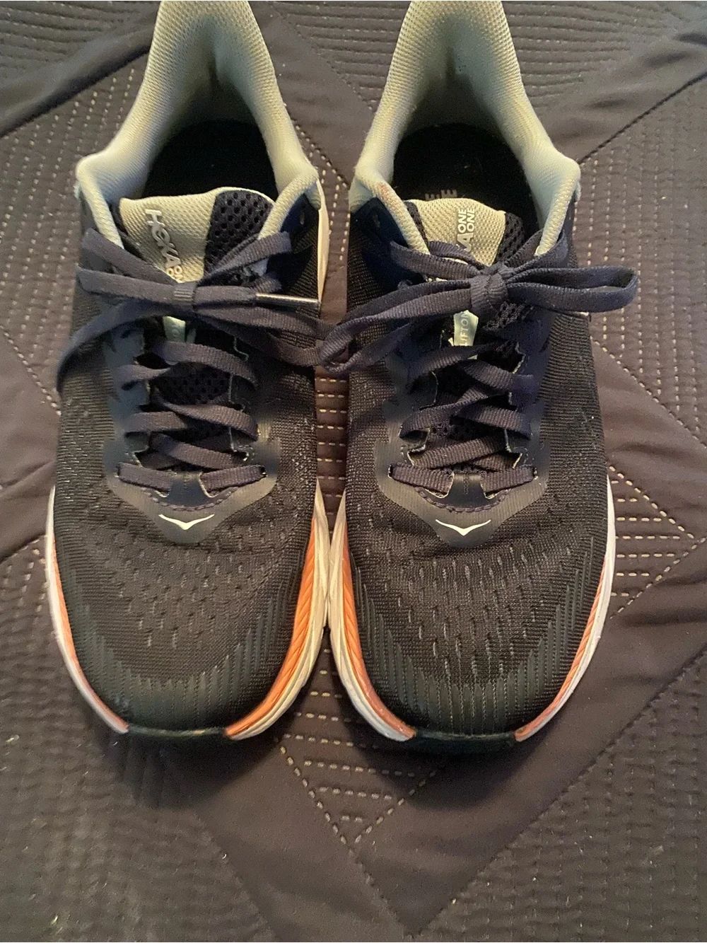 Hoka Running Sneakers in Black with Orange and White Details